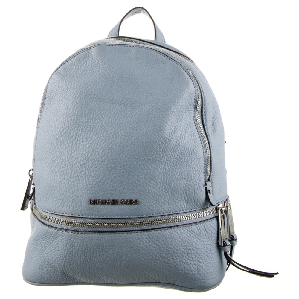 COPY - Michael Koran’s baby blue leather back pack